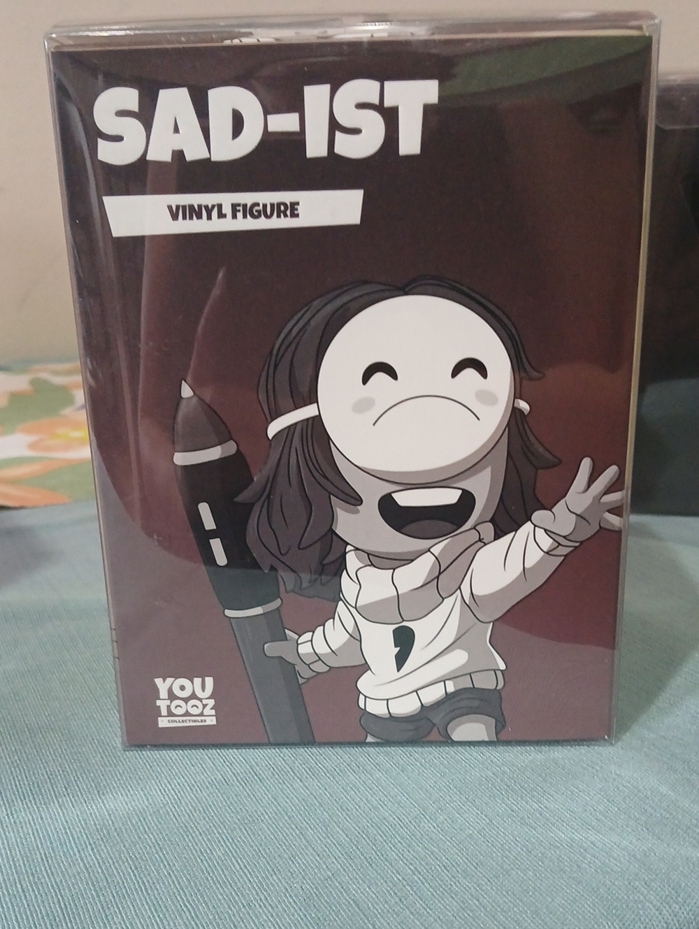 SAD-IST Vinyl Figure in Maroon & White Box